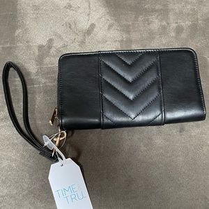 Brand new black leather wristlet holds plenty of cards.
